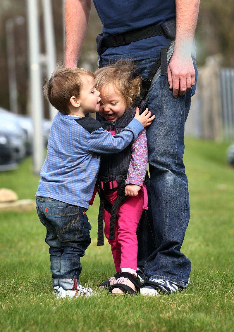 Illustration for article titled Walking Social: A Baby Carrier Gets Children Upright